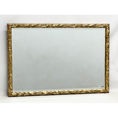 295 - A good quality vintage gilt framed mirror. The Steying Looking Glass Company. 81.5x56cm