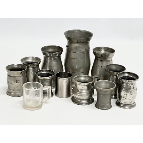 297 - A collection of 19th Century pewter measures/gills.