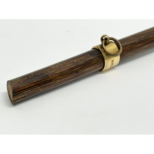 466 - An 18ct gold mounted walking stick top. Stamped G.P