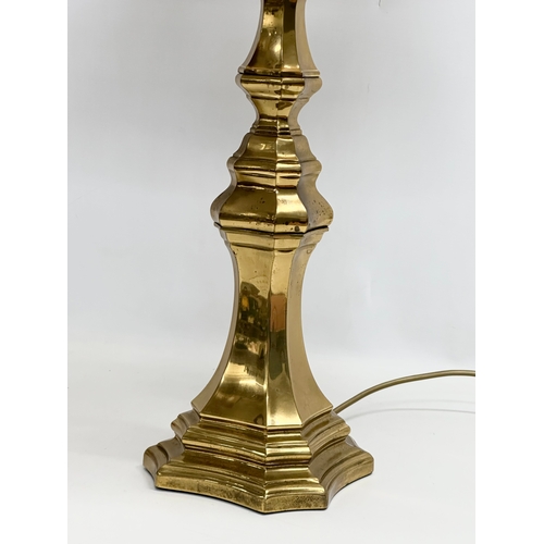 642 - A large vintage brass table lamp. 100cm