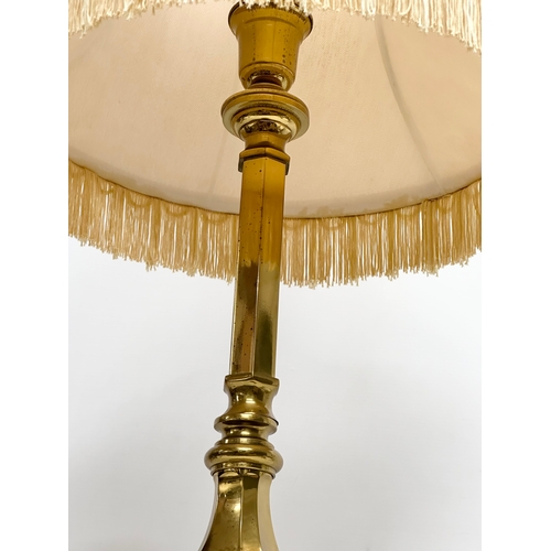 642 - A large vintage brass table lamp. 100cm