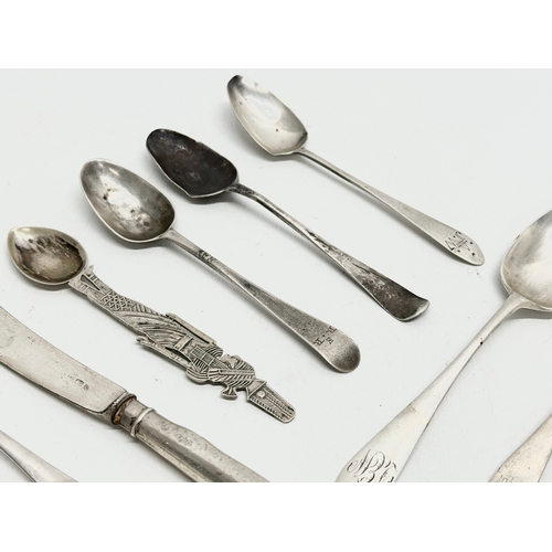 477B - A collection of silver spoons etc. 19th and 20th Century. 279 grams total.