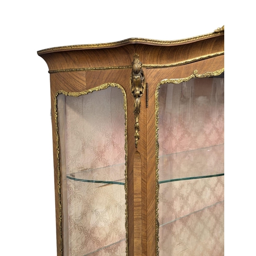 837 - A large good quality Early 20th Century Louis XV style vitrine / display cabinet with brass ormolu m... 