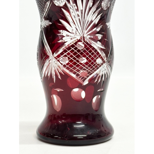 680 - A Mod 20th Century Bohemian glass vase. 10x17.5cm.