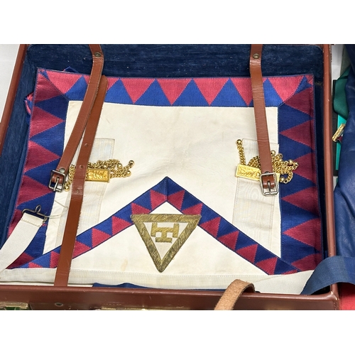 668 - A large collection of Masonic memorabilia. Medals (1 silver) aprons/sashes etc.