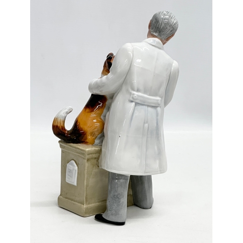 673 - A Royal Doulton “Thanks Doc” figurine. HN2731. 22.5cm