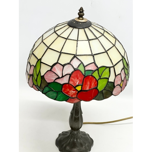 674 - A Tiffany style table lamp. 31x51cm