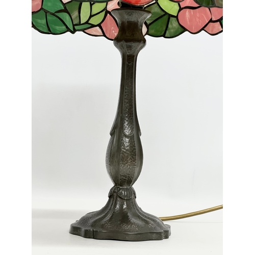 674 - A Tiffany style table lamp. 31x51cm