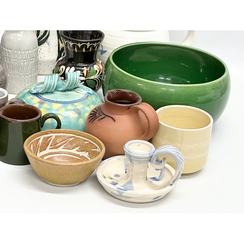 682 - A collection of vintage studio pottery.