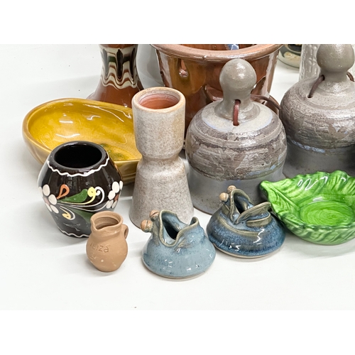 682 - A collection of vintage studio pottery.