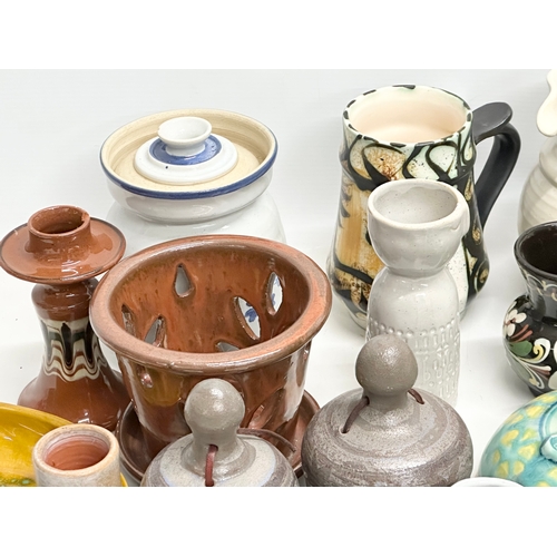 682 - A collection of vintage studio pottery.