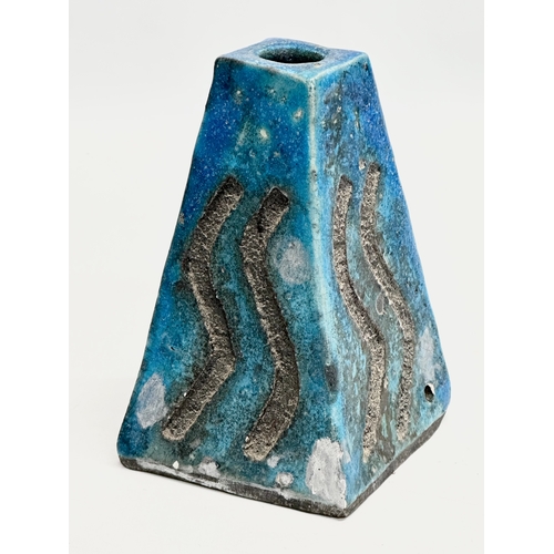 683 - A signed studio pottery volcano lamp base. Signed Philip. 9x9x14cm.