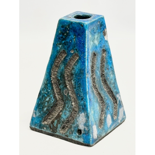 683 - A signed studio pottery volcano lamp base. Signed Philip. 9x9x14cm.