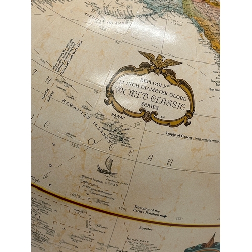 702 - World Classic Series. A tabletop globe. Replogle 12 inch diameter globe.