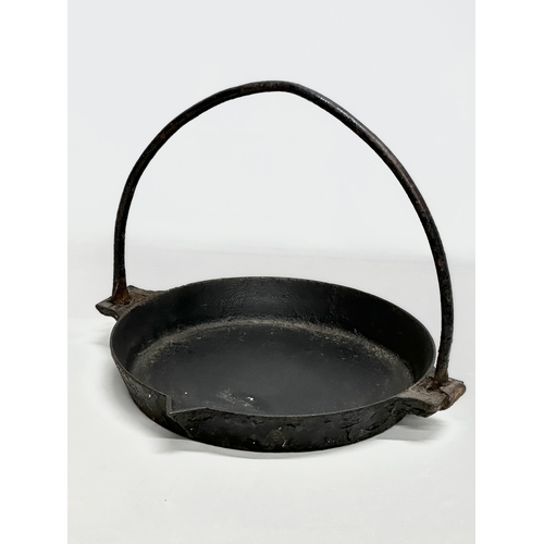 405E - Swain. A 19th Century cast iron griddle pan by Swain. 38x33x32cm