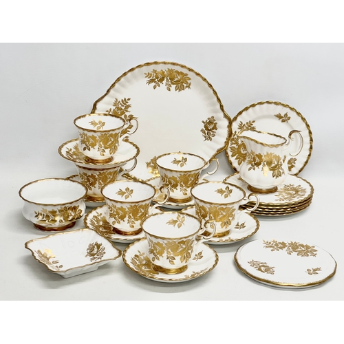 346 - A 23 piece Royal Albert “Golden Rose” tea service.