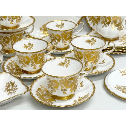 346 - A 23 piece Royal Albert “Golden Rose” tea service.