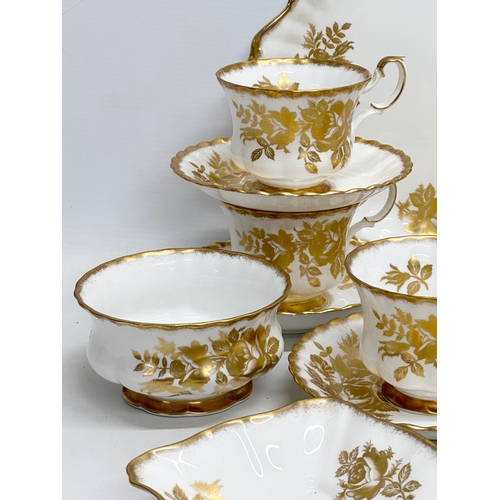 346 - A 23 piece Royal Albert “Golden Rose” tea service.