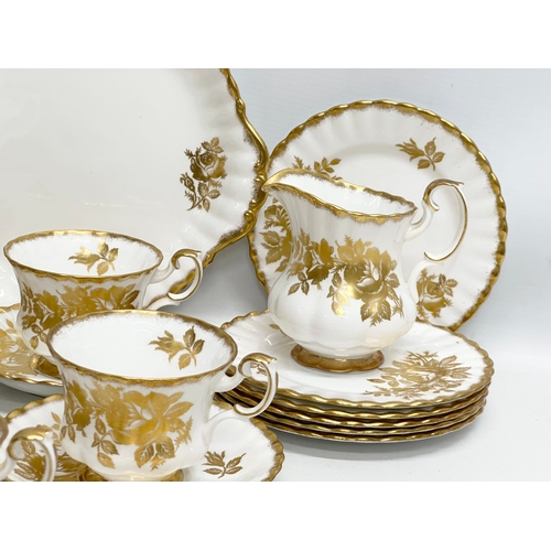 346 - A 23 piece Royal Albert “Golden Rose” tea service.