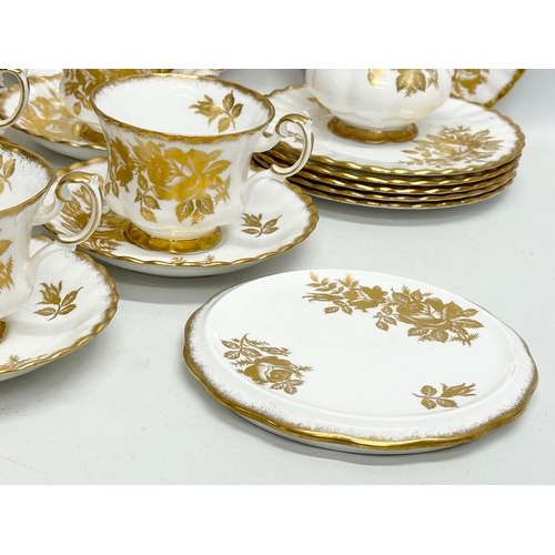 346 - A 23 piece Royal Albert “Golden Rose” tea service.