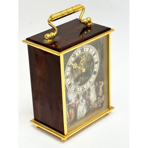 301A - A small Imof Swiss 15 Jewell eight day carriage clock. 7x5x10cm.