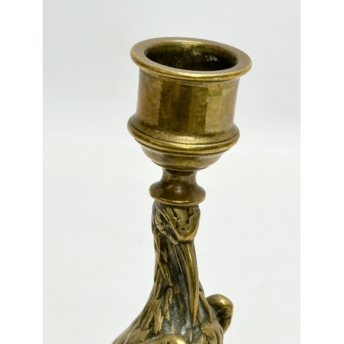 743 - A good quality Early 20th Century brass candlestick. 12.5x20cm