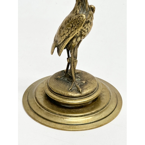 743 - A good quality Early 20th Century brass candlestick. 12.5x20cm