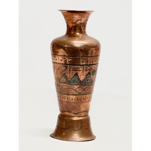 686 - An Early 20th Century Egyptian copper vase. 19cm.