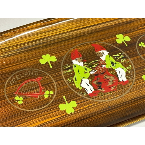 727 - An Irish simulated rosewood lacquered tray. 44x23.5cm