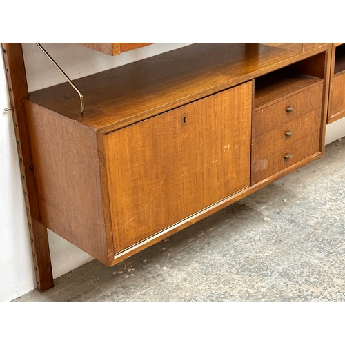 804 - Poul Cadovius. A Danish Mid Century teak “Royal System” modular wall unit. Designed by Poul Cadovius... 