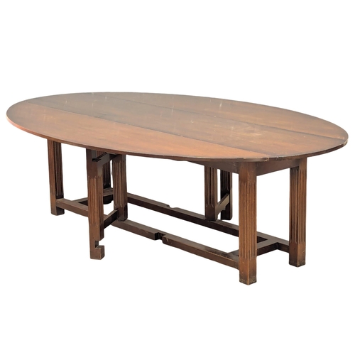 1069 - A very large mahogany hunt / wake table. Extended 154x244.5x75cm(7)