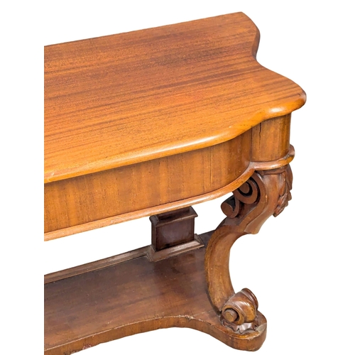 1064 - A Late 19th Century mahogany duchess hall table on Cabriole legs. 105x46x70cm(7)