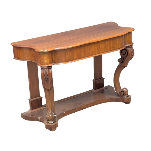 1064 - A Late 19th Century mahogany duchess hall table on Cabriole legs. 105x46x70cm(7)