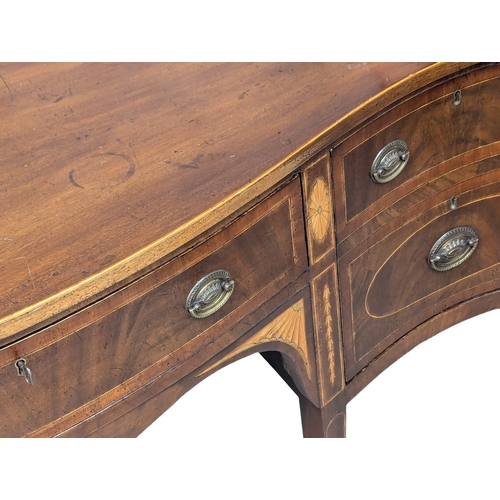 1083 - A Late 18th Century, George III, inlaid mahogany sideboard in the Sheraton style on square tapering ... 