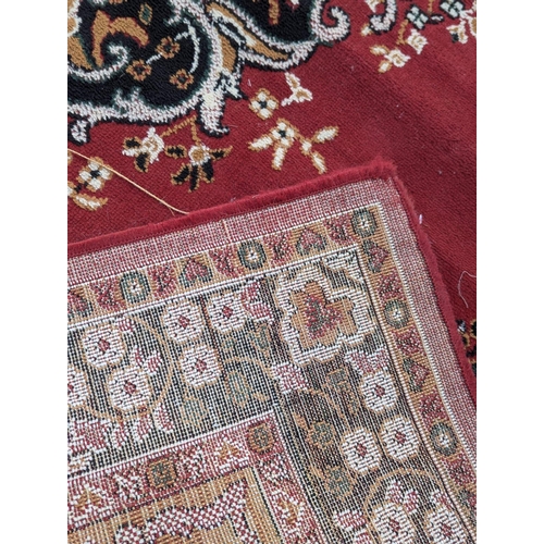 1060 - A vintage Middle Eastern style rug. 244x180cm(7)