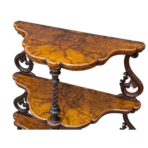 1056 - A Victorian walnut three tier whatnot. 80x40x96.5cm(6)