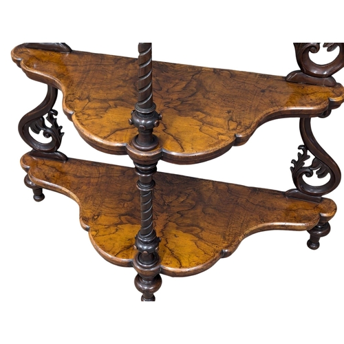 1056 - A Victorian walnut three tier whatnot. 80x40x96.5cm(6)