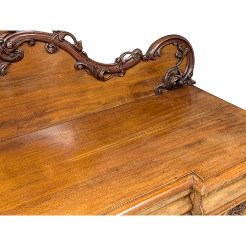 1101 - A large Victorian mahogany pedestal sideboard with three drawers. 209x67x149cm(4)