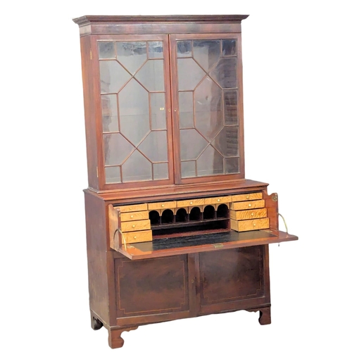 1077 - A large George III mahogany secretaire bookcase with astragal glazed doors. Top not original. 130x58... 