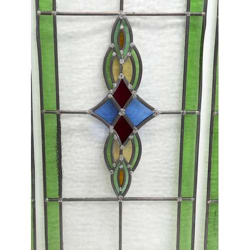 352 - A set of 3 large Early 20th Century stained glass panels. 39x98cm