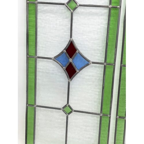 352 - A set of 3 large Early 20th Century stained glass panels. 39x98cm