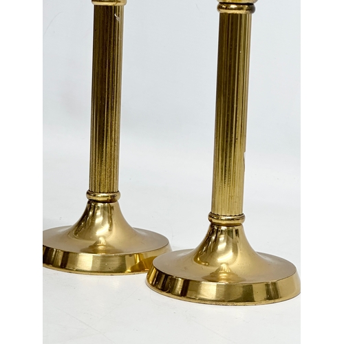 697 - A pair of vintage Victorian style brass candlesticks. 21cm