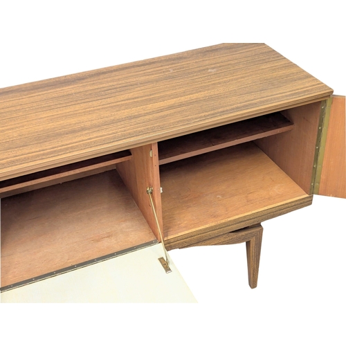 1001 - A Mid Century simulated rosewood melamine sideboard. 161x45.5x76cm(1)