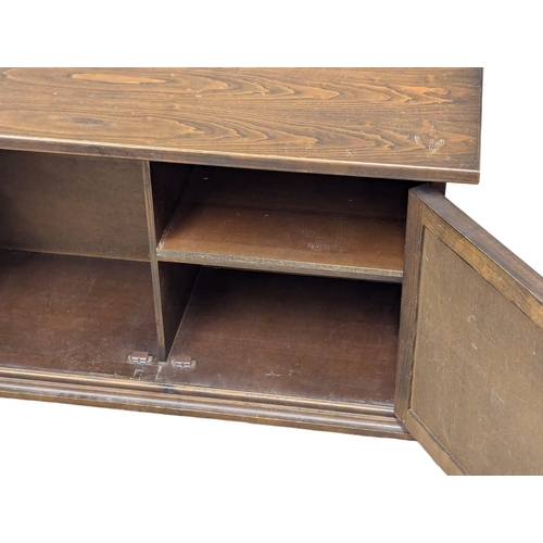 1006 - An oak side cabinet by Younger Furniture. 102x41x59cm (6)