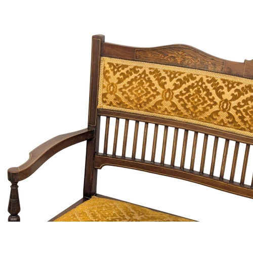 1014 - An Edwardian inlaid mahogany parlour sofa. 111cm (3)