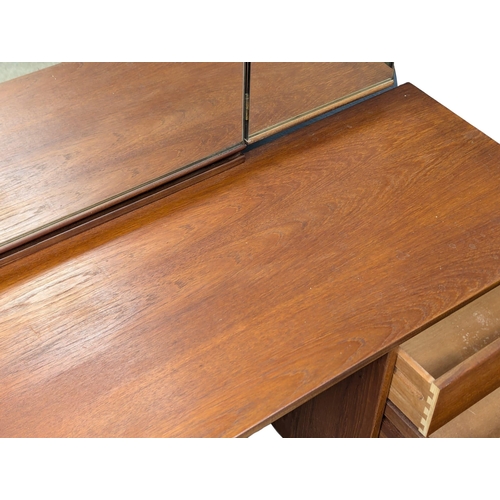 1019 - A Mid Century teak 'Cantata' dressing table designed by John & Sylvia Reid for Stag. 151x44x127.5cm.... 