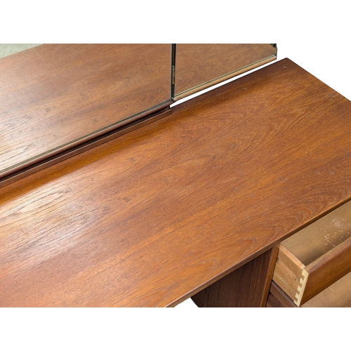 1019 - A Mid Century teak 'Cantata' dressing table designed by John & Sylvia Reid for Stag. 151x44x127.5cm.... 