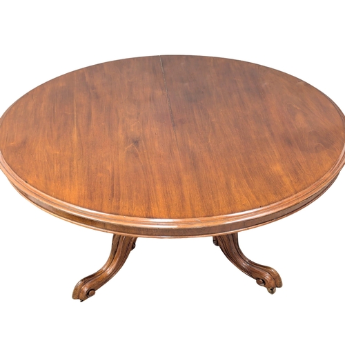 1021 - A Victorian mahogany pedestal breakfast dining table. 127x72cm (5)