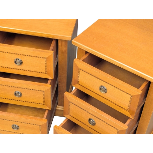 1032 - A pair of inlaid bedside chests. 46x42x62cm (2)