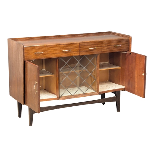 1037 - A Mid Century sideboard by Lebus. 122x44x85.5cm (4)